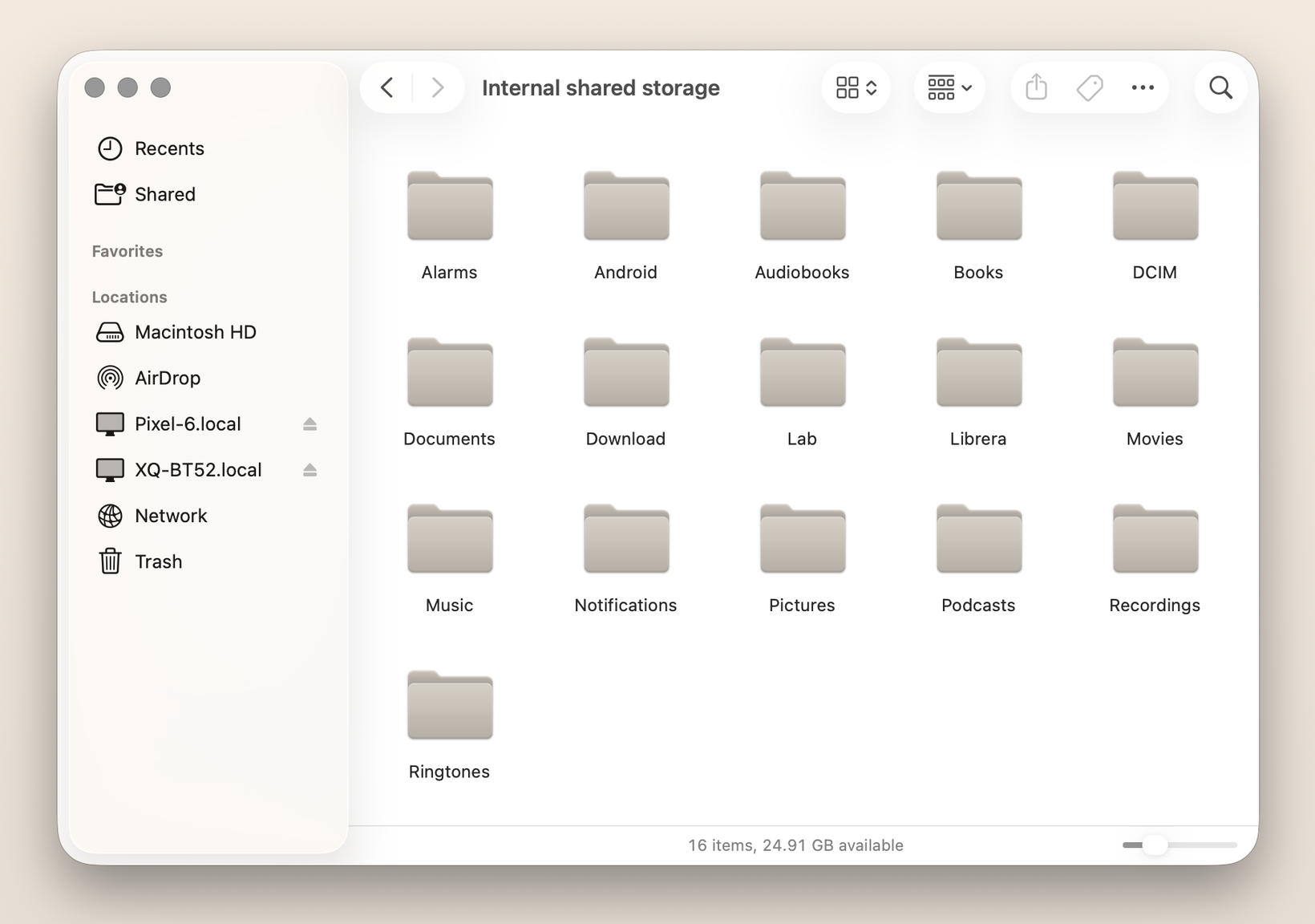 An Android phone mounted as a volume in macOS Finder: a Pixel 6 listed under Locations in the sidebar (Pixel-6.local), its internal storage open in the window